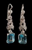 A pair of aquamarine and diamond pendant earrings: each with a rectangular aquamarine 10mm long x 7.