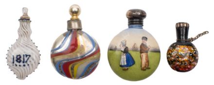 Three glass scent bottles and one other: comprising a miniature example,