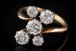 A gold and diamond five-stone cluster ring: with graduated round,