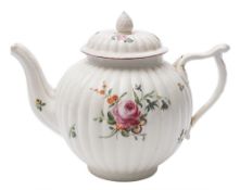 A Menecy porcelain teapot and cover: of reeded globular form with angular scroll handle,