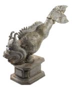 A 19th century lead figure of a Koi type fish: with inset blue glass eyes, open mouth with teeth,