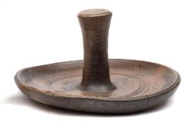 A late 19th century sycamore mushroom-shaped treen butter worker: possibly Welsh, 19 cm wide.