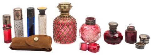 Six coloured glass scent bottles and two others: various colours, some with cut decoration,