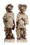 A pair of late 18th/early 19th century carved wood standing figures:, of classical warriors,