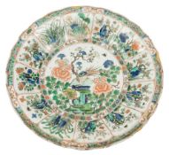 A group of three Chinese famille verte dishes and bowls: brightly enamelled with either birds and