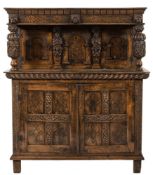 A carved oak and marquetry court cupboard:, in the 17th Century taste,