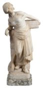 An alabaster figure of a Dutch girl: wearing a tied bodice and long skirt and sabots with a