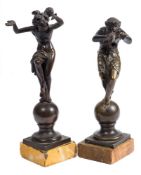 A pair of Grand Tour bronze dancing figures: one of a man with a putto on his back,