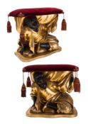 A pair of mid 19th Century Venetian carved giltwood and ebonised Blackamoor stools,