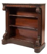 An early Victorian mahogany low open bookcase:, surmounted by a panel of rouge fossilized marble,