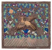 A Chinese embroidered silk work panel: depicting a phoenix rising towards the sun, 28 x 30cm.