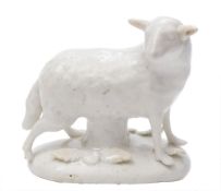 A Longton Hall 'Snowman' model of a ewe: standing with head turned to dexter,