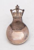 A George V hammered silver jubilee caddy spoon, maker Robert Edgar Stone, London,