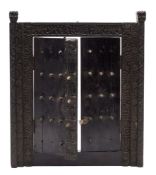 A 19th century Indo - Colonial carved coromandel frame: of rectangular form with a pair of brass