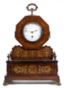 A Regency rosewood clock: the eight-day duration movement having a platform lever escapement,