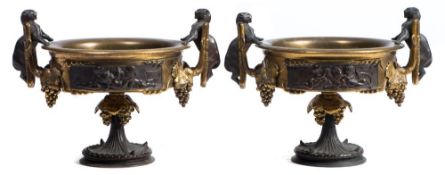A pair of late 18th/early 19th century French ormolu and bronze tazze: with gilt bowls on bronze