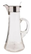 A late Victorian silver mounted and clear glass claret jug, maker William Hutton & Sons, Birmingham,