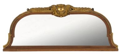 A late 19th Century French walnut and gilt bronze mounted domed overmantel mirror:,