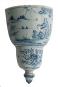 A London blue and white delftware wall pocket: of D form with slightly concave back,