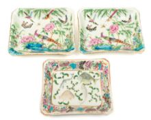A pair of Canton famille rose dishes and one similar: of shaped rectangular form,