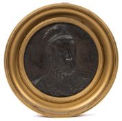 After Pilon, a bronze plaque of Henri III: contained within a gilt circular frame, 16cm. diameter.