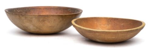 Two American treen mixing or dough bowls: one inscribed 'Munising', probably 1920s,