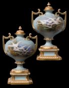 A pair of Royal Worcester two-handled vases and covers painted by Charles Baldwyn: each with swans