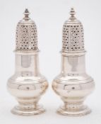 A pair of George II silver pepperettes, maker's mark worn, London,