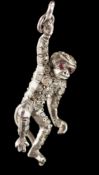 A paste-set monkey pendant: with cabochon eyes, 32mm long, 2.