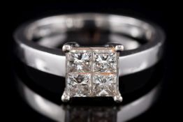 An 18ct white gold and princess-cut diamond,