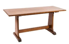 An Arts and Crafts oak and inlaid dining table and set of six dining chairs:,