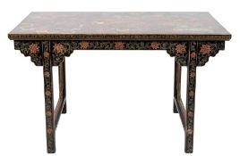A Chinese black lacquer and decorated altar table:, with all over profuse ornament of dragons,