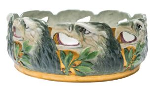 A Pirkenhammer porcelain bowl: of circular form the exterior pierced and moulded with eagles and