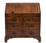 An early 18th Century walnut and feather banded bureau:,