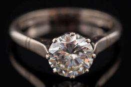 A diamond solitaire ring: the circular, brilliant-cut diamond approximately 7.8mm diameter x 4.