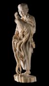 A Japanese carved ivory okimono of a man with long tailed rooster perched on his hand: wearing