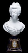 A French bisque porcelain bust of Marie Antoinette: in the white on a royal blue and gilt