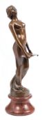 An Art Nouveau period bronze female signed Vavra: the semi naked female wearing flowing robes and