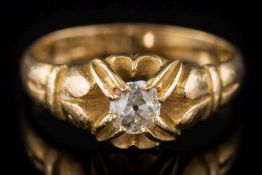 An 18ct gold and diamond single-stone ring: with round old brilliant-cut diamond approximately 0.