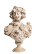An Art Nouveau period alabaster bust of a girl: her hair in curls and a bun,