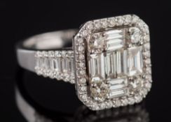 A modern diamond mounted cluster ring: with baguette-cut and circular-cut diamond panel within a