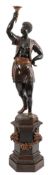 A late 19th Century carved wood Blackamoor figure:, modelled as a standing female figure,