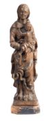 A 19th Century German carved hardwood figure: Madonna and Child,