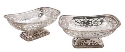 A pair of George V silver pedestal serving baskets, maker P Ashberry & Sons, Sheffield,