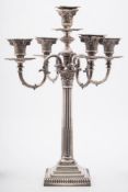 A silver plated five-light Corinthian column candelabra: with foliate capital nozzles on four