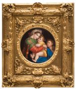 A German porcelain circular plaque: painted in the Berlin manner with the 'Madonna della Sedia'