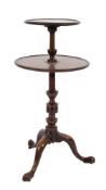 A mid 18th Century mahogany circular two-tier graduated dumb waiter:,