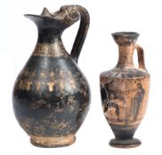 An ancient Greek pottery Oinochoe (wine vessel): of ovoid form with banded decoration,