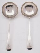 A pair of George III silver Old English pattern sauce ladles, maker David Crawford, Newcastle,