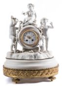 A French Victorian bisque mantel clock: the eight-day duration movement stamped with the trademark